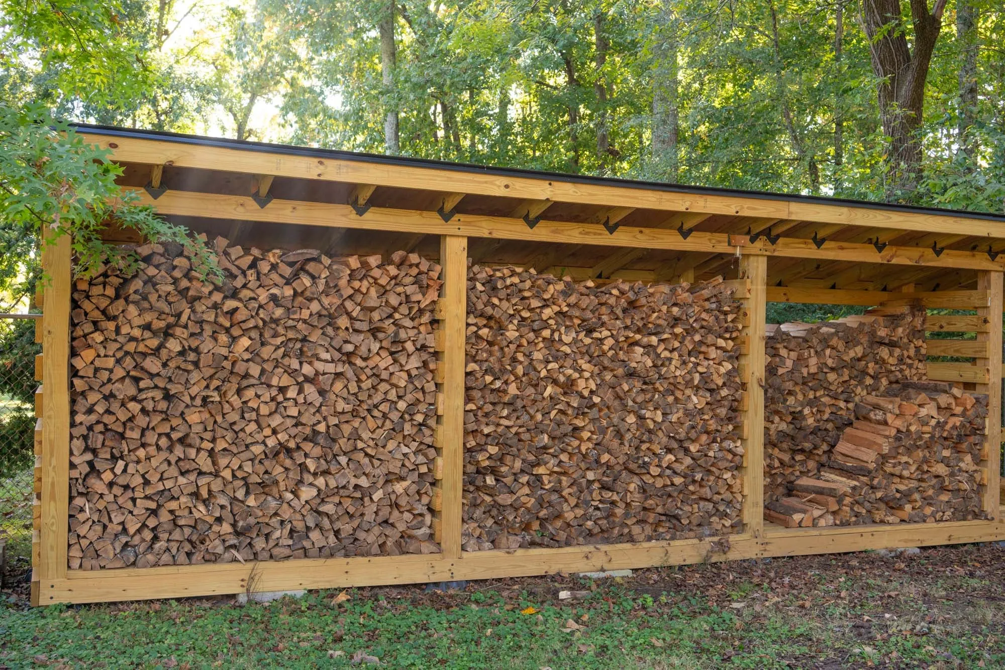 Custom three-bay firewood shed